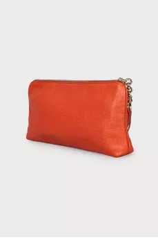 Orange leather clutch