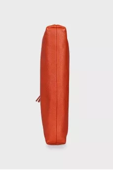 Orange leather clutch