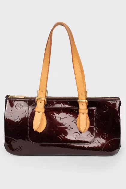 Bag from varnish leather in a corporate print