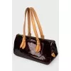 Bag from varnish leather in a corporate print