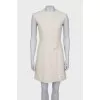 White dress with golden pin