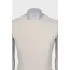 White dress with golden pin