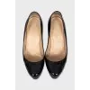 Black patent leather heeled shoes