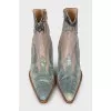 Leather Cossacks with a pointed toe and a zipper