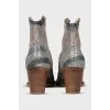 Leather Cossacks with a pointed toe and a zipper