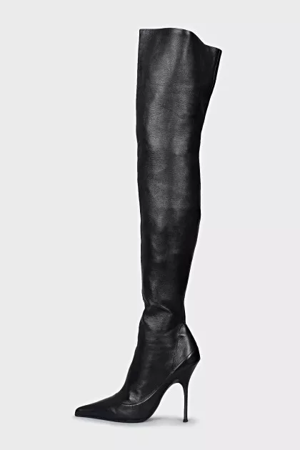 Over the knee boots with a figured heel