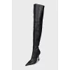 Over the knee boots with a figured heel