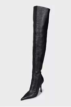 Over the knee boots with a figured heel
