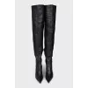 Over the knee boots with a figured heel