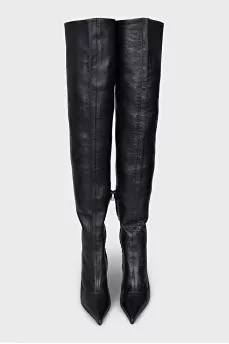 Over the knee boots with a figured heel