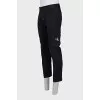 Men's trousers with a branded patch