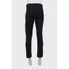 Men's trousers with a branded patch