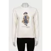 White sweatshirt with branded print and tag