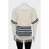 Semi-transparent jumper with fringe