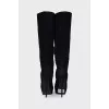 Black suede boots with a zipper