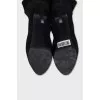 Black suede boots with a zipper