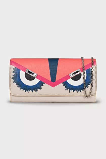 Leather clutch on a chain decorated with crystals