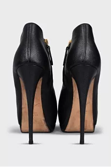 Leather ankle boots with high soles and heels