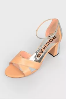 Sandals with a silver closed heel