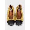 Leather ballet flats with contrasting toes