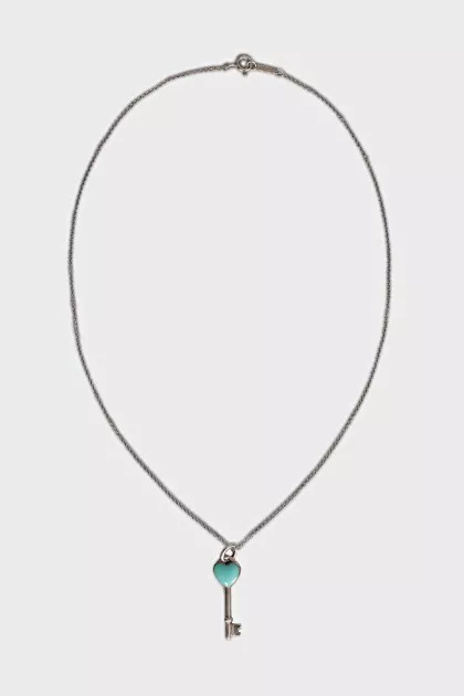 Silver pendant in the shape of a key