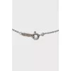 Silver pendant in the shape of a key
