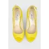 Yellow shoes with an open toe