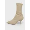 High boots on a stiletto
