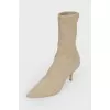 High boots on a stiletto