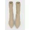 High boots on a stiletto