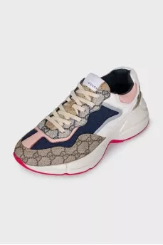 Sneakers with the Rhyton signature print