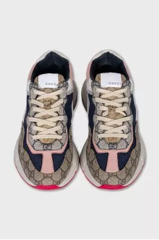 Sneakers with the Rhyton signature print