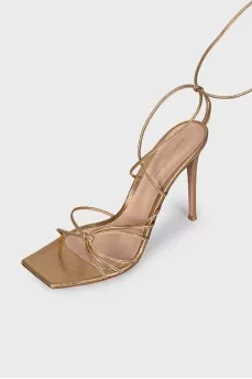 Gold lace-up sandals