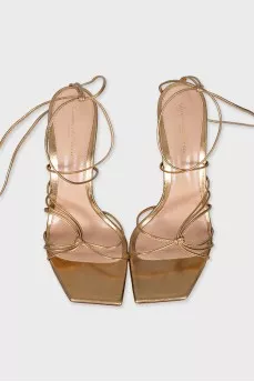 Gold lace-up sandals