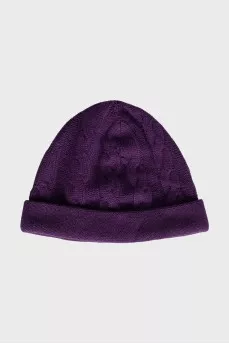 Knitted hat in purple color