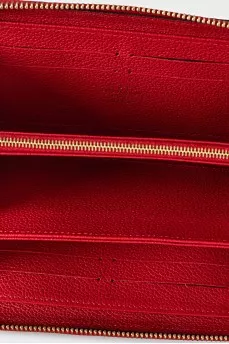 Red wallet with branded embossing