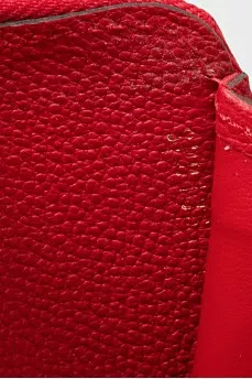 Red wallet with branded embossing