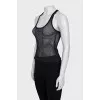 Perforated T-shirt with tag