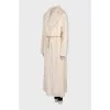 Maxi fur coat with a gold belt