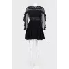 Dress with mesh inserts with tag