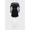 Dress with mesh inserts with tag