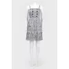 Blick with a large fringe on the straps