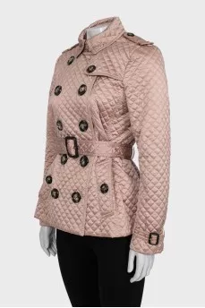 Quilted jacket with buttons and belt