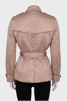 Quilted jacket with buttons and belt
