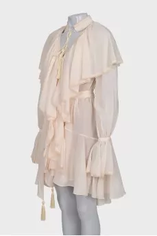 Dress with ruffles and tassels