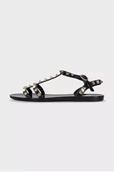Sandals decorated with golden spikes