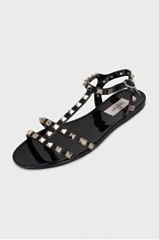 Sandals decorated with golden spikes