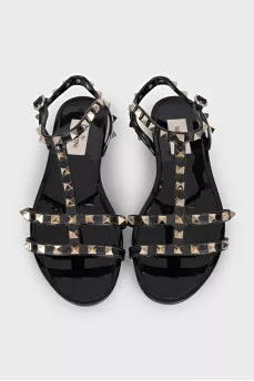 Sandals decorated with golden spikes