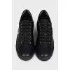 Men's black leather sneakers with tag