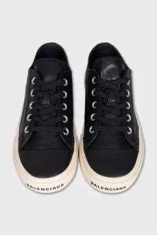 Leather sneakers with a logo on the front